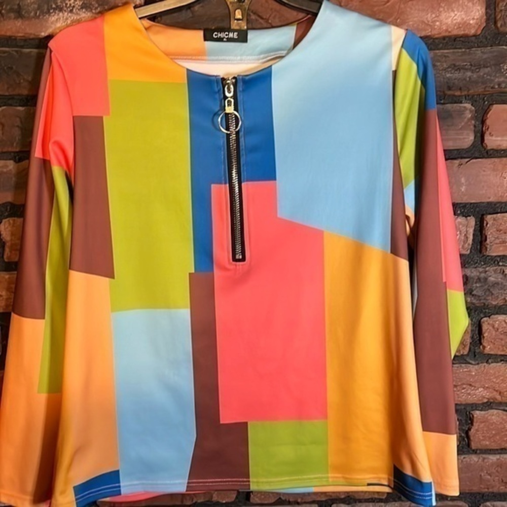 Never worn colorful blouse.
